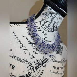 Handmade bead necklace with very delicate mesh but string is strong blue